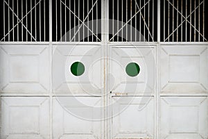 Image of a metal white gate