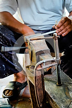 Image of Metalworker working in workshop