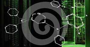 Image of molecule structures over illuminated server room in background