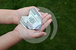 Image of money hand grass background