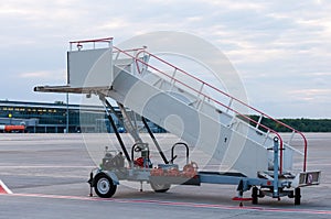 The image of a movable boarding ramp at the photo