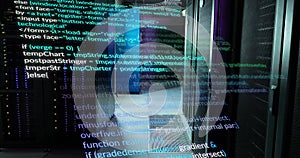 Image of multicolored computer language over data server room