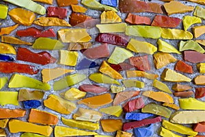 Image of a multicolored stained glass window with irregular block pattern