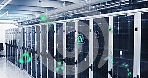 Image of multiple icons, viewfinders with lens flares over data server room