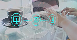 Image of network of connections with icons over hands using laptop