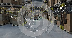 Image of network of connections with icons over machines working in warehouse