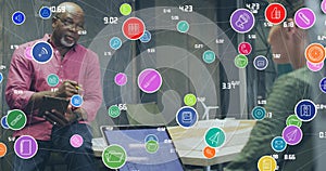 Image of network of digital icons over diverse man and woman discussing at office