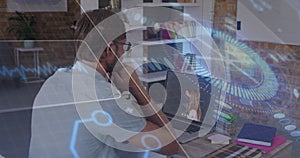 Image of networks of connections over and data processing over businessman working in office