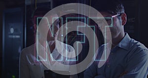 Image of nft and data processing over diverse it engineers by computer servers