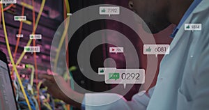 Image of notification bars, african american engineer checking data server system using laptop