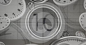 Image of number ten in vintage black and white film projector countdown with clocks and watches