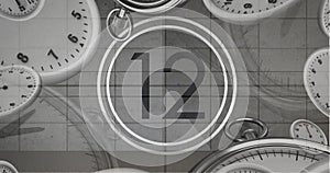 Image of number twelve in vintage black and white film projector countdown with clocks and watches