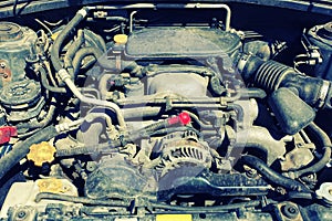 Image of an old sport car rusty engine.