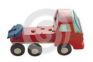 An image of an old toy truck without a trailer isolated on a white background