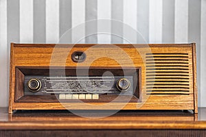 Image of old vintage radio on the wooden table