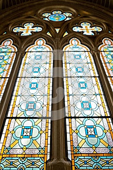 Image of one of the large and colorful stained glass windows of Burgos Cathedral. photo