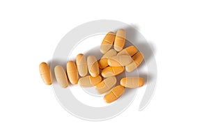 Image of orange pills isolated with shadows