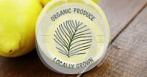 Image of organic produce locally grown text over fresh lemons