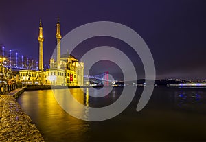 Image of Ortakoy Mosque with Bosphorus Bridge in Istanbul at night.