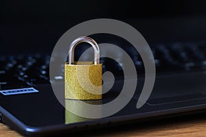 Image of padlock on laptop security concept