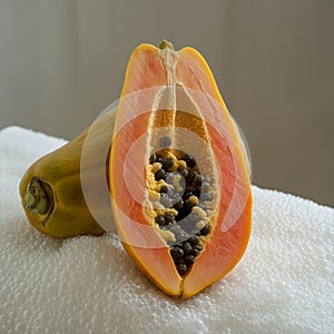 An image a papaya on neutral white background isolated , generated by AI