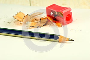 Image of pencil sharpener, pencil and shavings