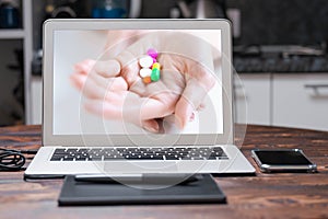 Image of pills on a female palm. The concept of medicine, health care, vitamins