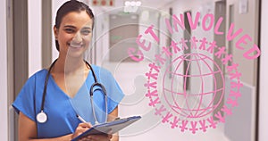 Image of pink breast cancer text over female smiling doctor