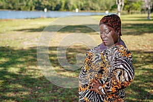 Image of a plus size model bbw posing outdoors in the park photo