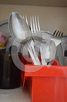 Spoons and fork in the druer in the closet