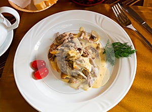 Image of a popular meat dish made called Swiss beefstroganoff.