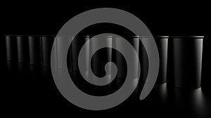 A row of identical black cylindrical containers.