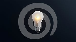 A single light bulb against a black background.