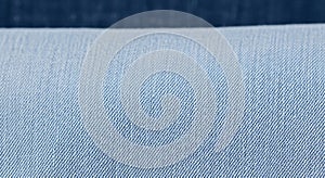 Soft washed light blue denim textile background