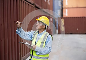 Image of professional container controllers who organize container deliveries and moves to maximize resources and minimize delays