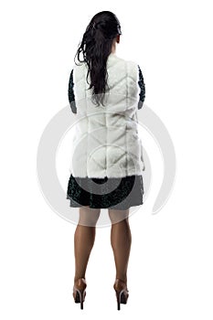 Image pudgy woman in white fur jacket, from back