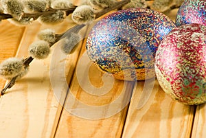 image of pussy-willow and easter eggs on a table closeup