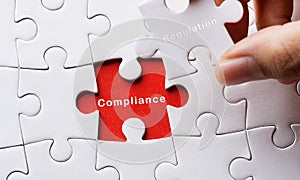 Image of Puzzle with Compliance and regulation