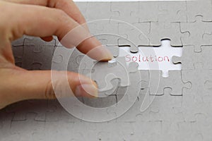 Image of Puzzle piece with solution