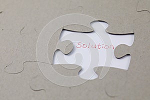 Image of Puzzle piece with solution