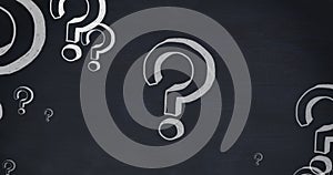 Image of question marks on black background