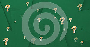 Image of question marks over green background