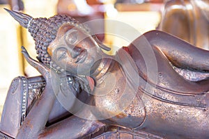 Image of reclining buddha with abstract background