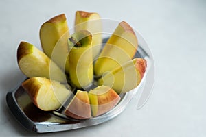 Image of red apple cut into pieces