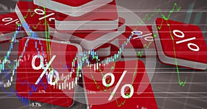 Image of red cubes with per cent sign over graphs and statistics photo