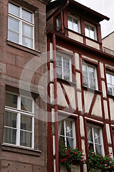 Image of a red and white building in the old town of Nuremberg, Germany.