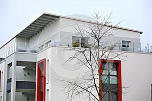 An Image of a residential home with modern facade painting, exterior shot photo