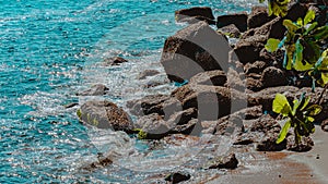 Image of rock formations stones, with texture and sharpness, on the beach during the day photo