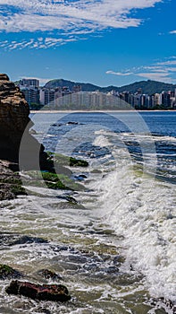 Image of rock formations stones, with texture and sharpness, on the beach during the day photo