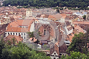 Image of roof tops and Piata Sfatului (Council Square) in Brasov, Romania